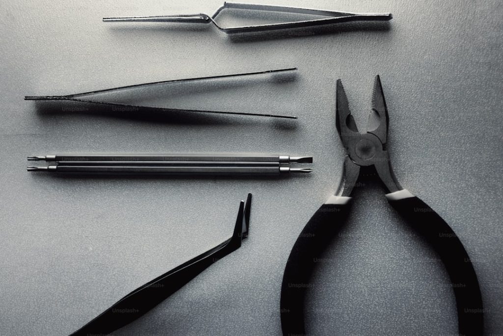 Various metal tools on a surface.