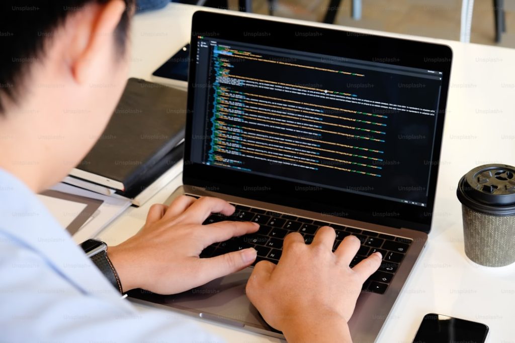 developer coding laptop AI future